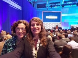 a selfie photo of Chris McEntee and Laur Fisher from MIT Climate CoLab in a session at the White House Frontiers Conference