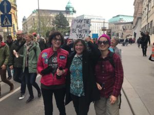 Photo of Chris McEntee with two women at the March for Science Vienna