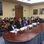 A photo of four women testifying on Capitol Hill