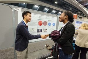 students-shaking-hands-poster-hall